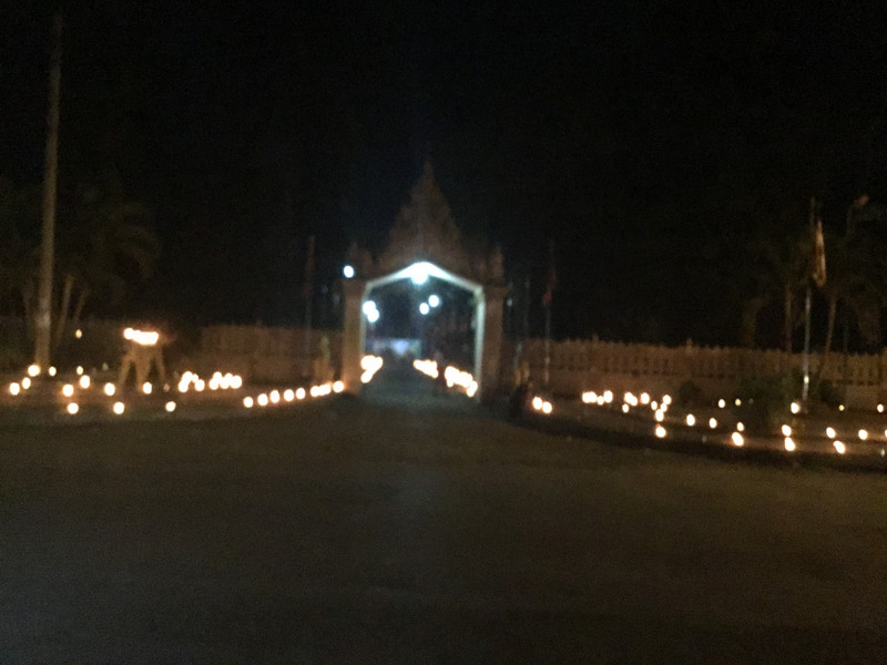 Candlelit procession to local temple