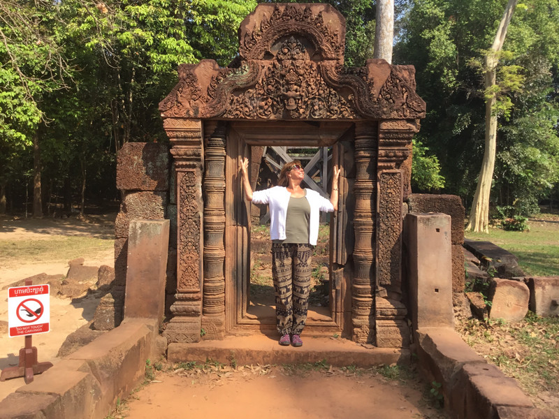 Banteay Srei - Paula helping to keep the stones in place