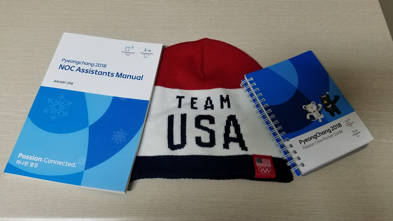 Manuals & Team USA hat.