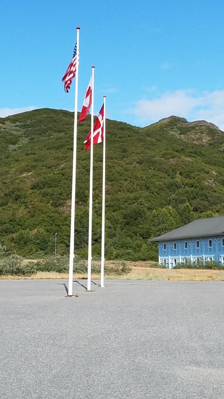 3 flags at the hotel: Us, Greenland, Denmark.