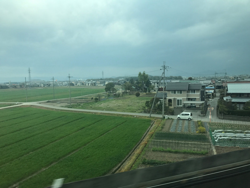 VIEW OF COUNTRYSIDE RIDING ON TRAIN TO NARITA AIRPORT