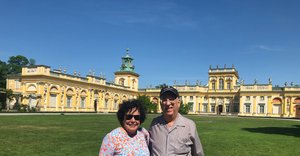 DENNIS & MARY IN FRONT OF THE ROYAL PALACE YESTERDAY