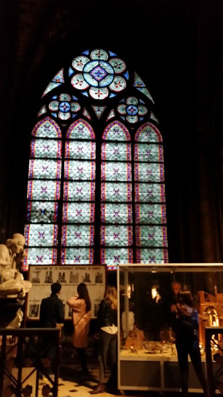 a stained glass window in Notre Dame