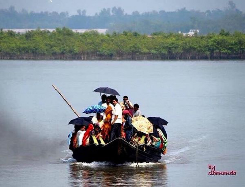 Local people travelling on boat