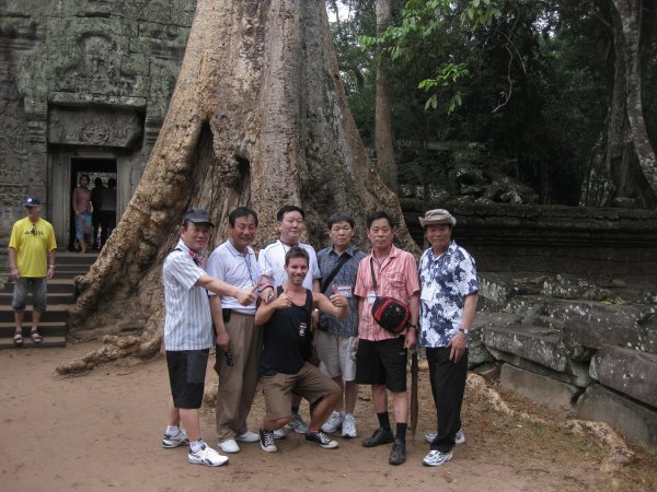 Getting a pic with other tourist at Angkor wat