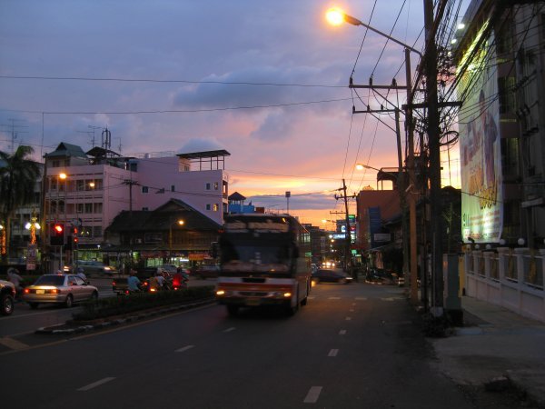 Sun setting over of the main streets in Trang