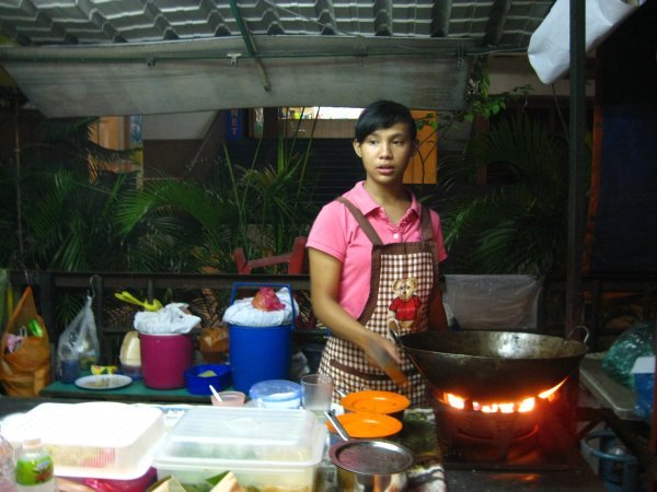 Our street cook - she made excellent fried rice