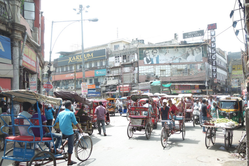 Enjoying a rickshaw ride through Chandni Chowk Market, Old Delhi