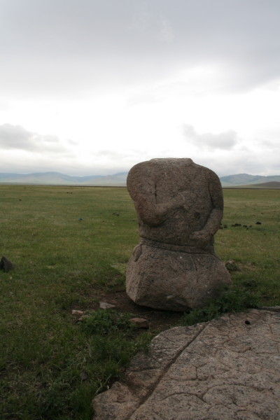 Headless stone statue
