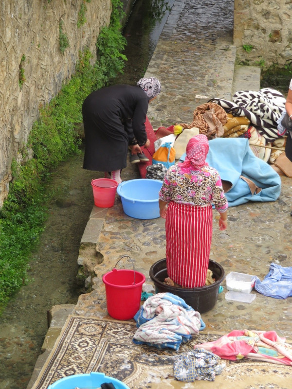 A old way of washing clothes and rugs