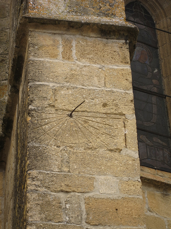Sundial on church wall