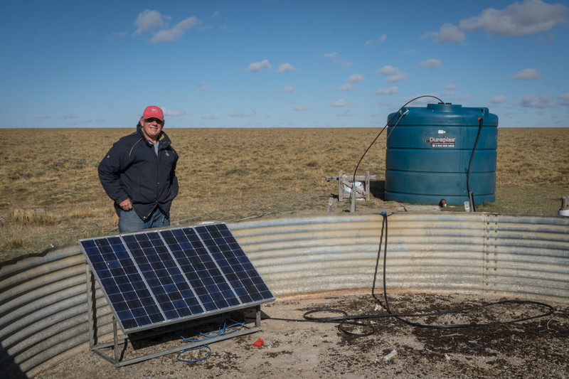 Steve looking over the solar powered water pump system