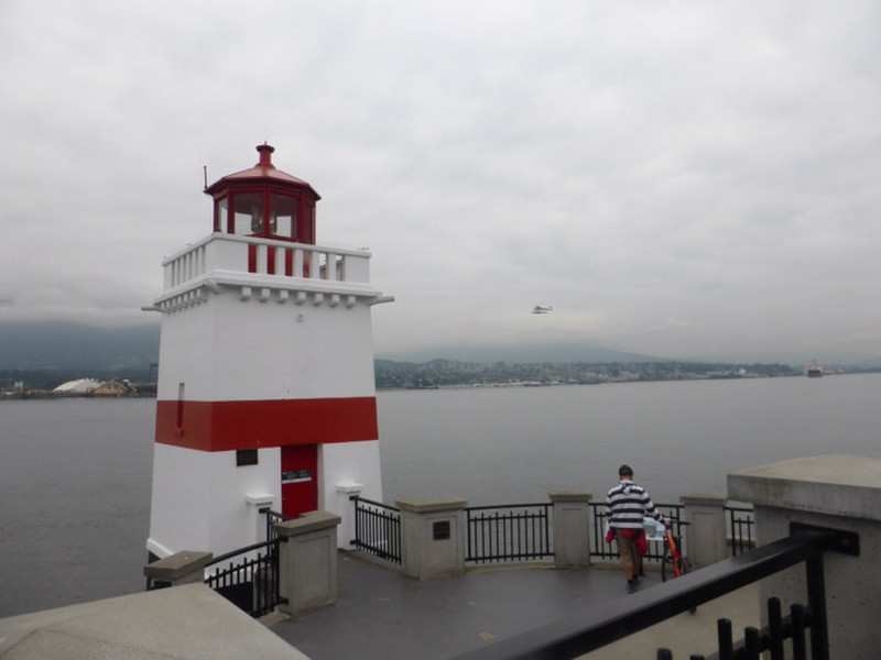 Grey skies, sea plane and lighthouse..typical Van