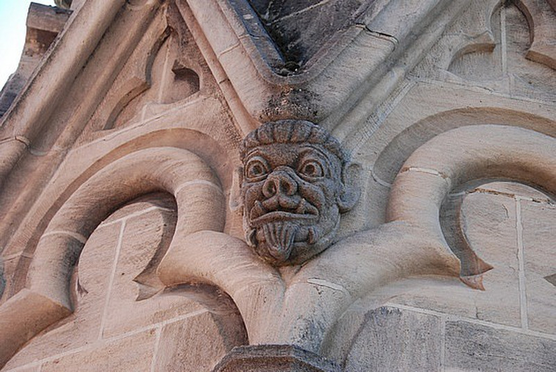 face on the tower of the church