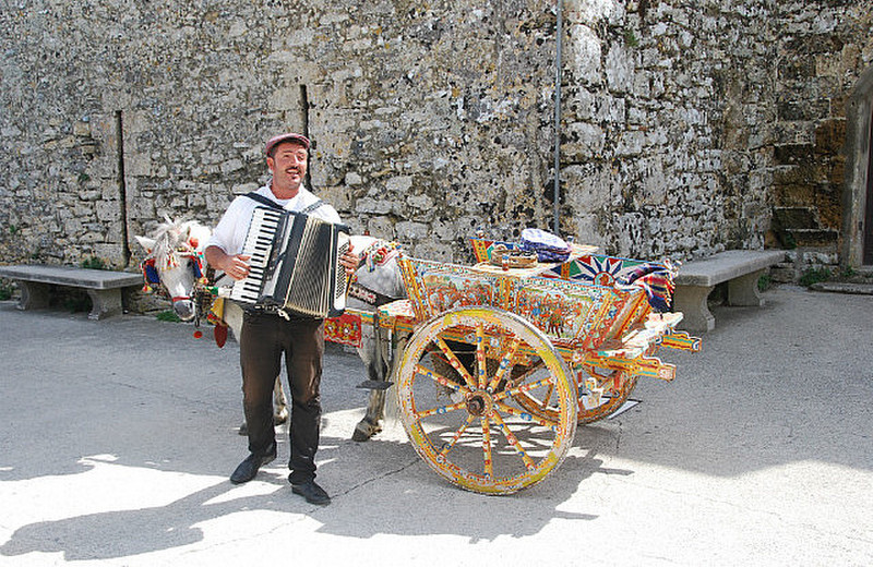 A musician by the castle in Erice