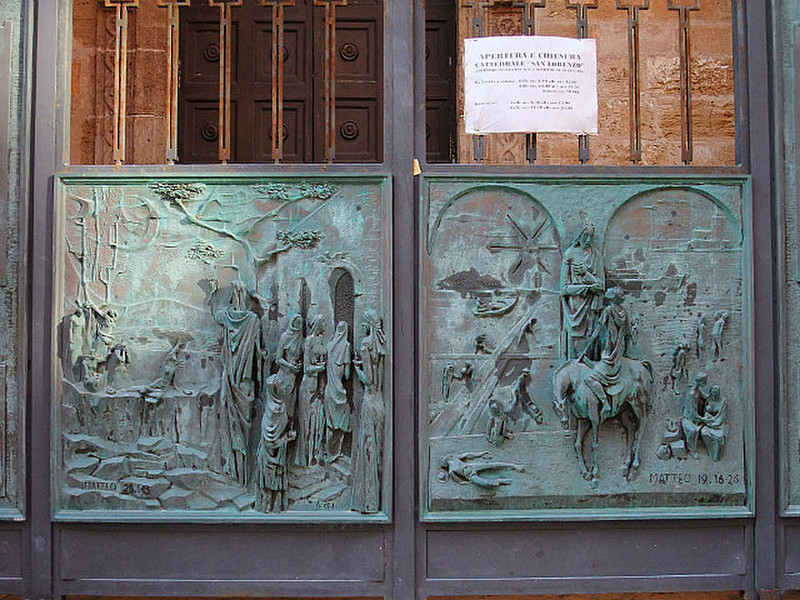 bronze plaques on the gates