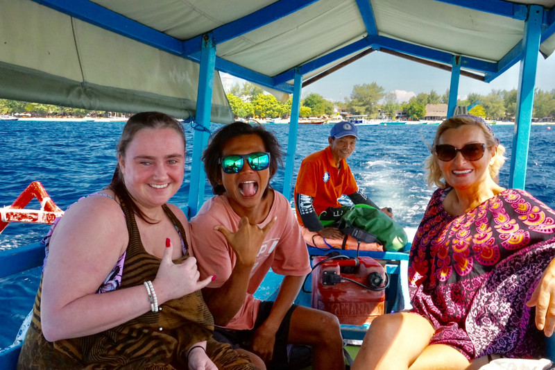 Taylah, Rudy, the skipper and Issy aboard our trusty outrigger canoe