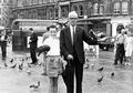 With my grandfather feeding the pigeons in Trafalgar Square