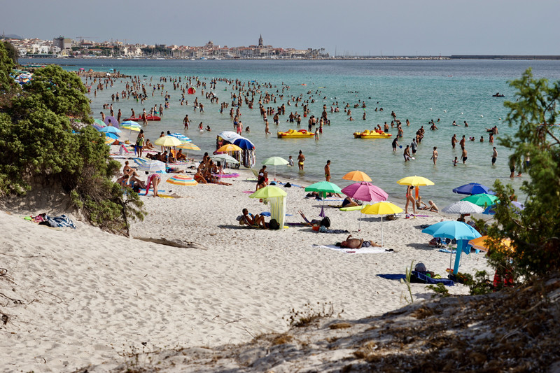 Alghero Beach, with the old town in the background