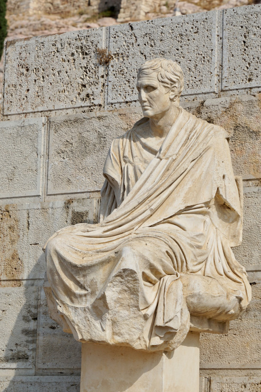 Statue at the foot of the Acropolis