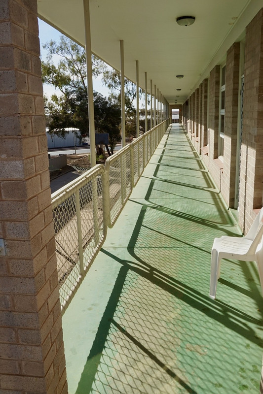 Our cell block walkway … sorry hotel room balcony …. Woomera Air For e Base