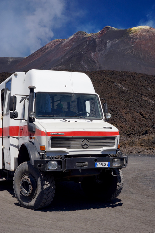The cross between a jeep and a bus that drives you up Mount Etna