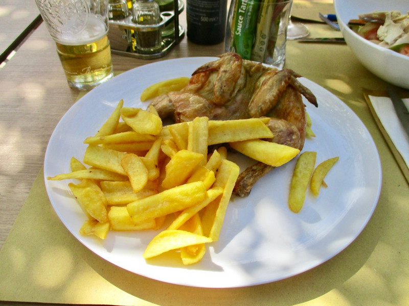 1/2 a roasted chicken w/chips