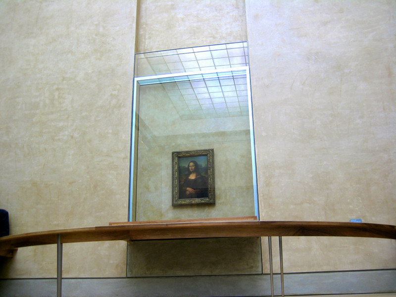 Mona behind bullet-proof glass