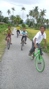 Local kids cycling with us