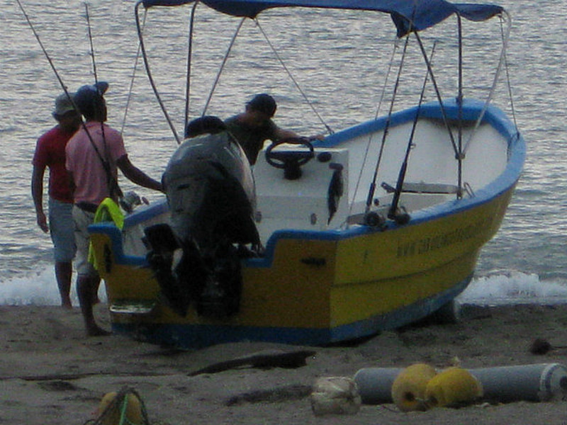 getting their boat into the water