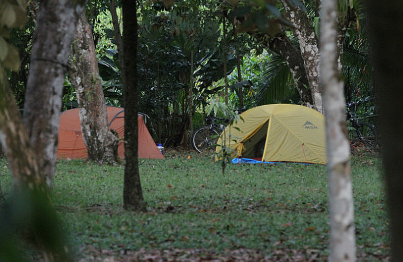 campers at campsite near lagoon