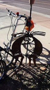 Cafe Soleil bike rack and kokopelli Sculpture 