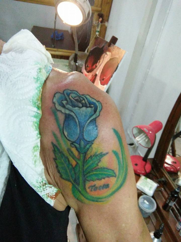 The Blue Rose Tattoo Restoration