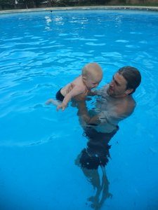 Swimming in the pool with daddy!