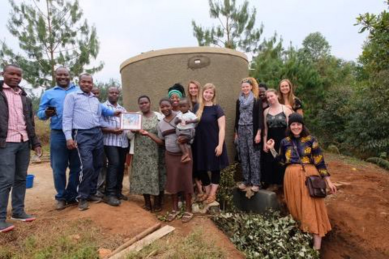 Health Centre Water Tank with Health Centre Staff