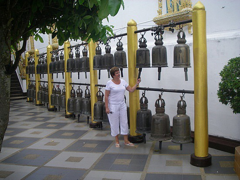 ringing bells at doi suthep -wat on the mountan