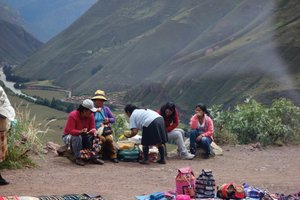 Peasants selling wares & trinkets along road to Cusco