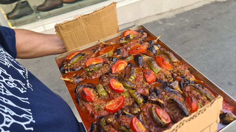 Eggplant and sausage with tomato