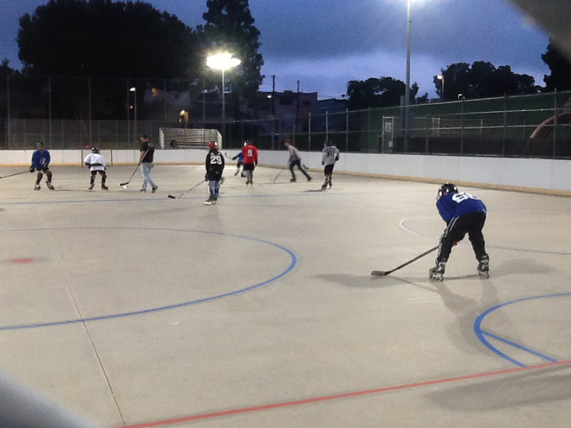Local kids playing roller hockey 