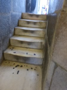Worn marble steps up there