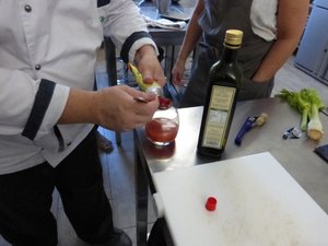 Mixing the tomato paste with a bit of water