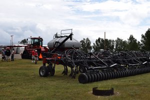 some modern farm machinery for planting and fertilizing. 