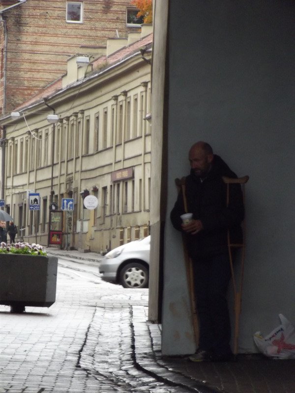 A beggar - they are frequently on the streets here
