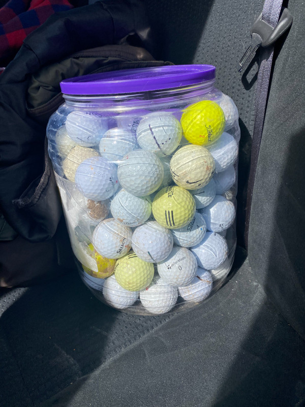 97 golf balls in this bucket!