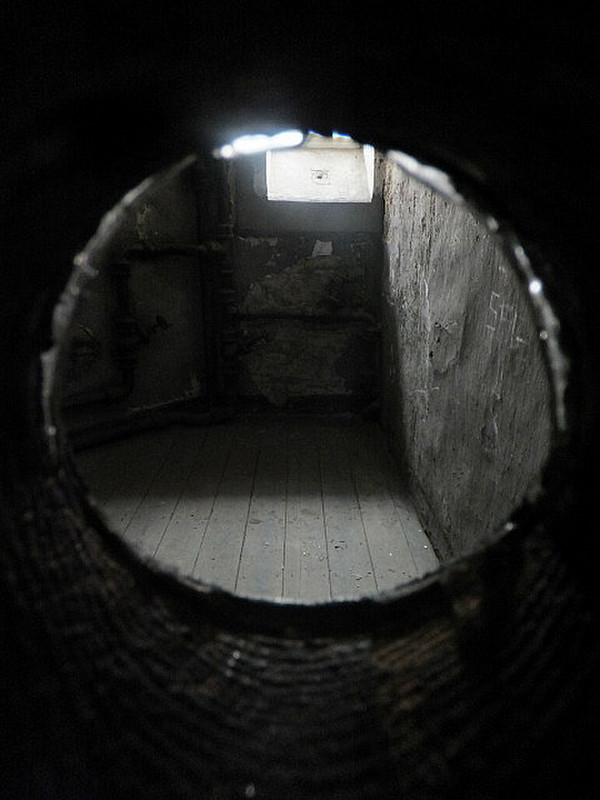 Looking inside the cell thru old door hole