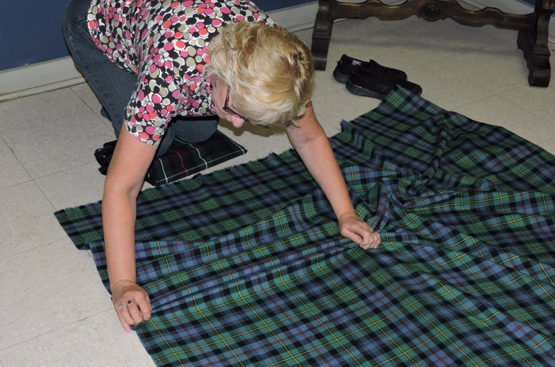Gaelic College: preparing kilt fabric 