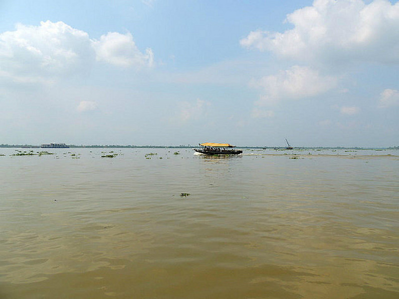 Our other sampan on the very wide Mekong