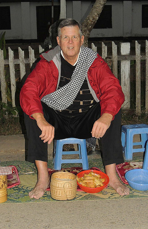 Patrick prepared for Laotian monk alms procession