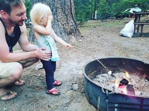 Making her First S'more