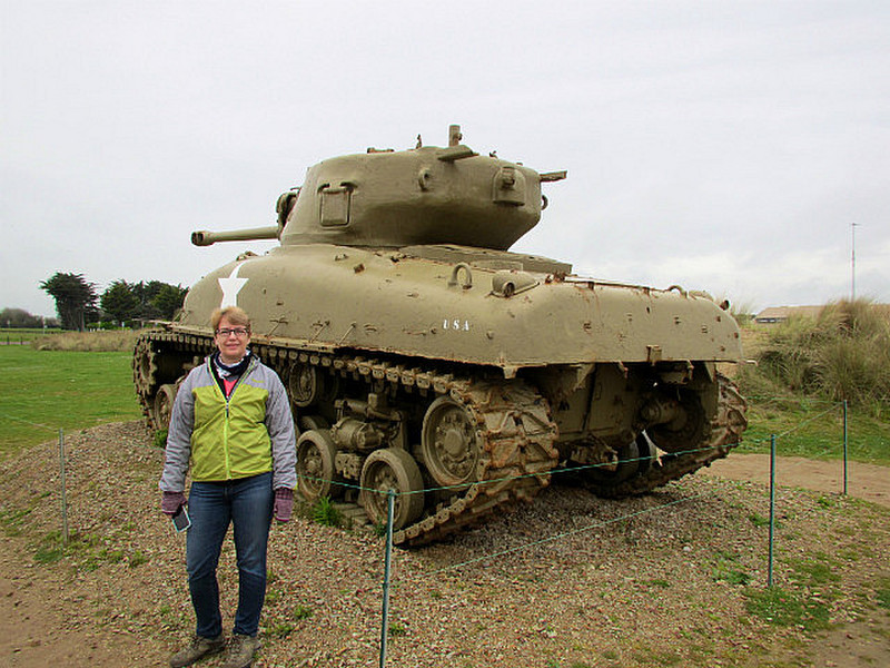 Chris is front of one of the tanks
